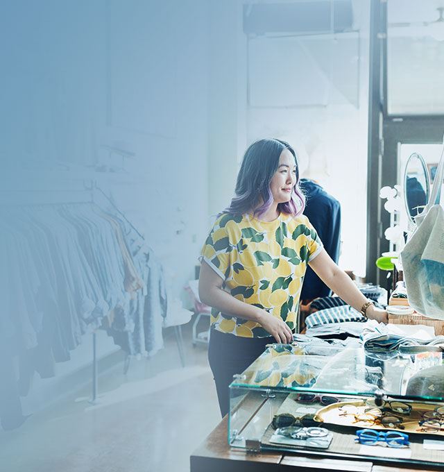 Retail store owner at work