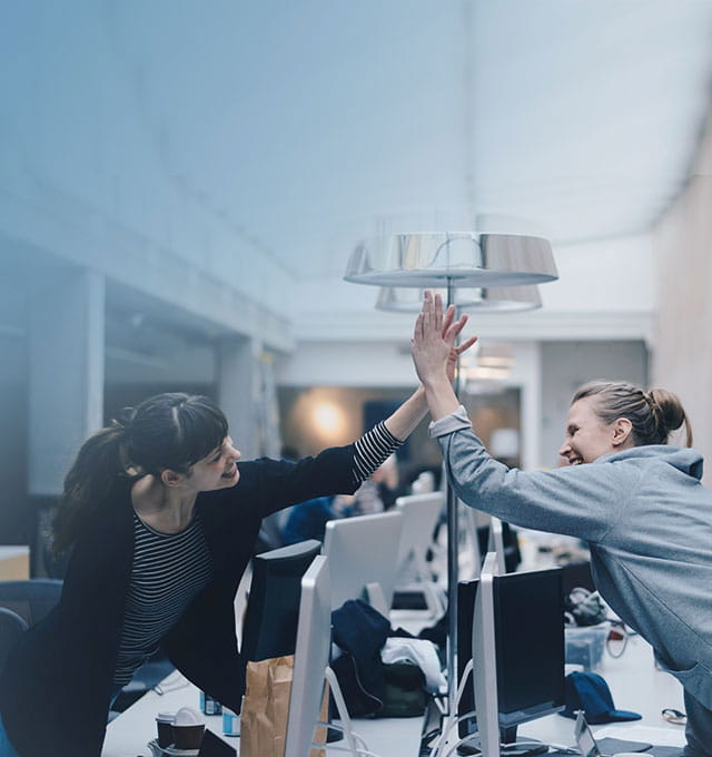 Team celebrating success with the high-five