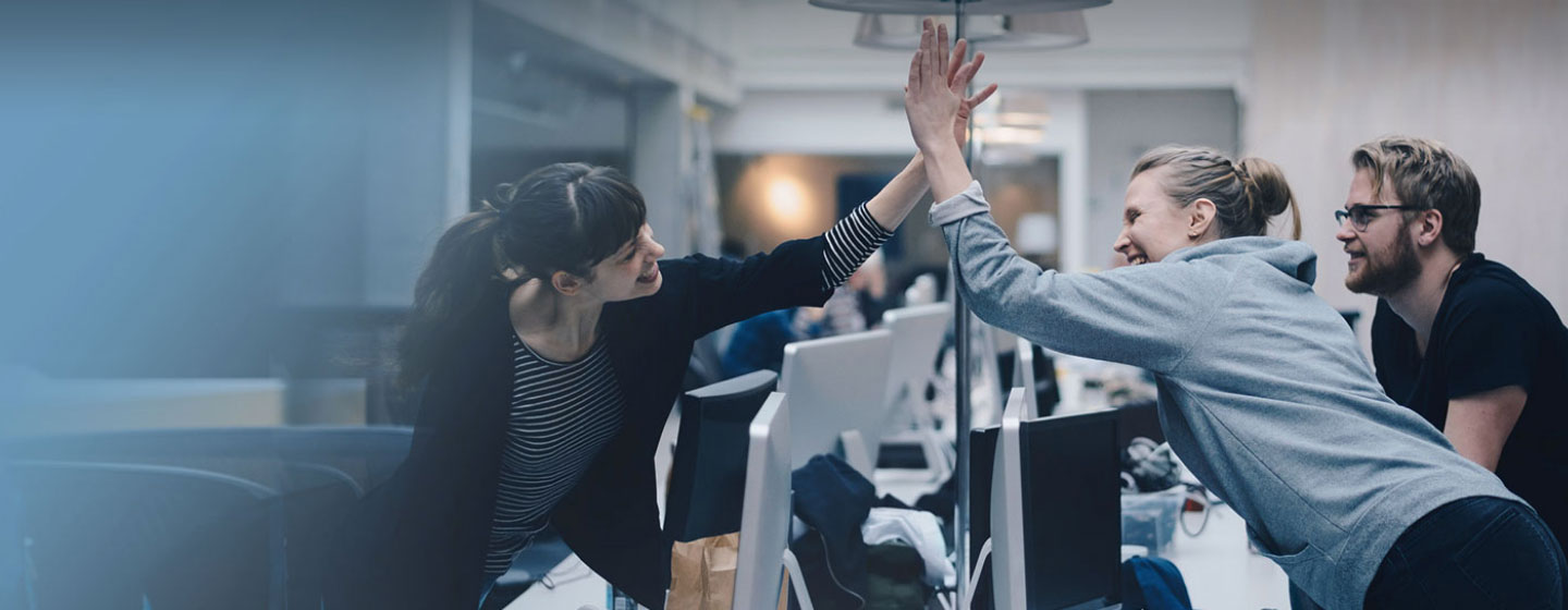 Team celebrating success with the high-five