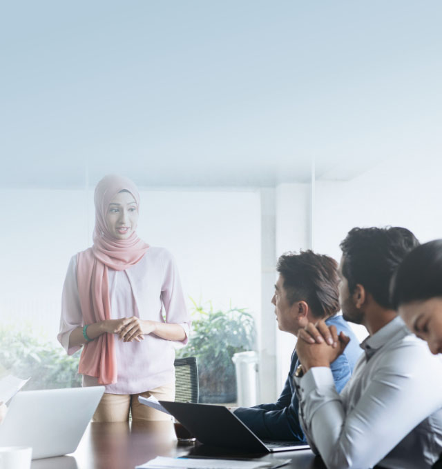Woman briefing the team